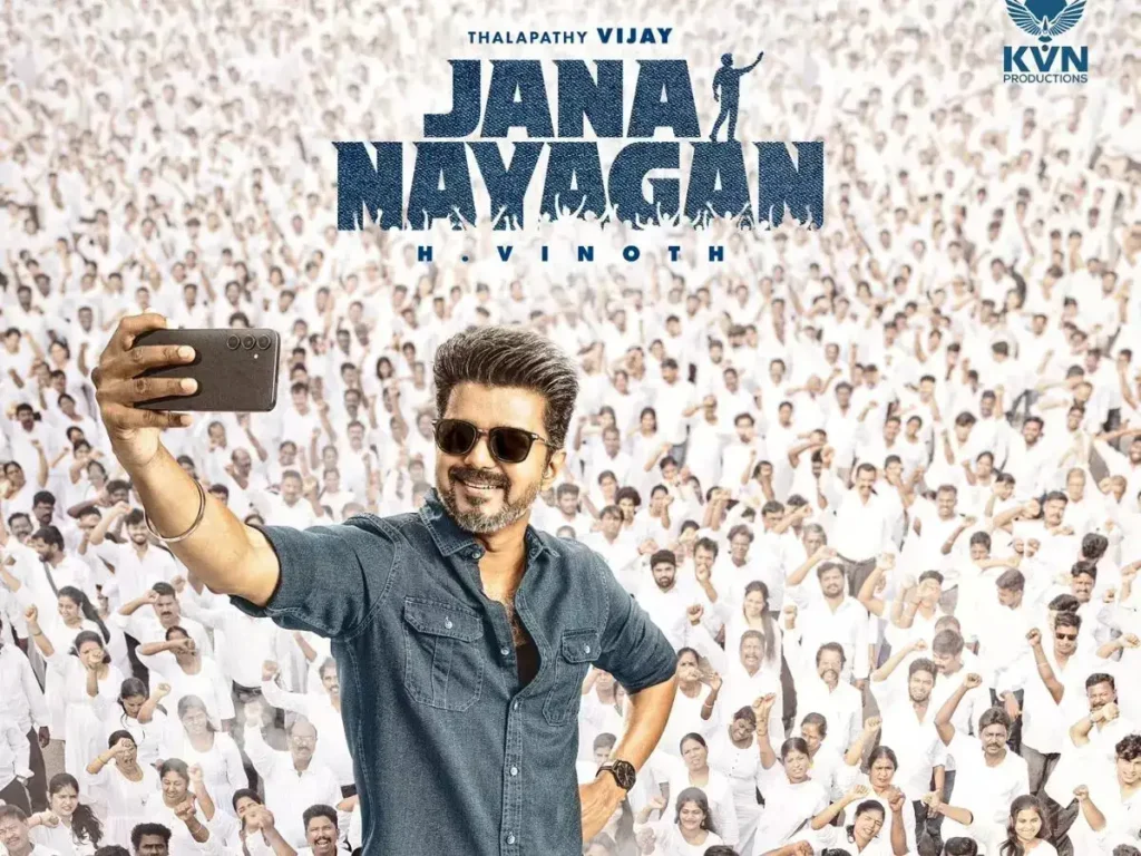 Thalapathy Vijay takes a selfie in front of a massive crowd of supporters in the first look poster of his final film “Jana Nayagan”, directed by H. Vinoth and produced by KVN Productions.